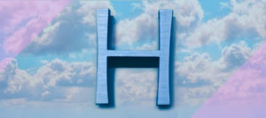 Letter H in a cloudy sky